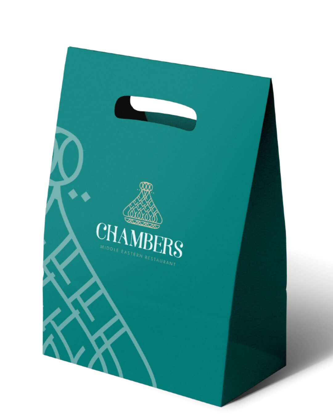A Turquoise carrier bag with the Chambers logo and the lattice wrapping its side