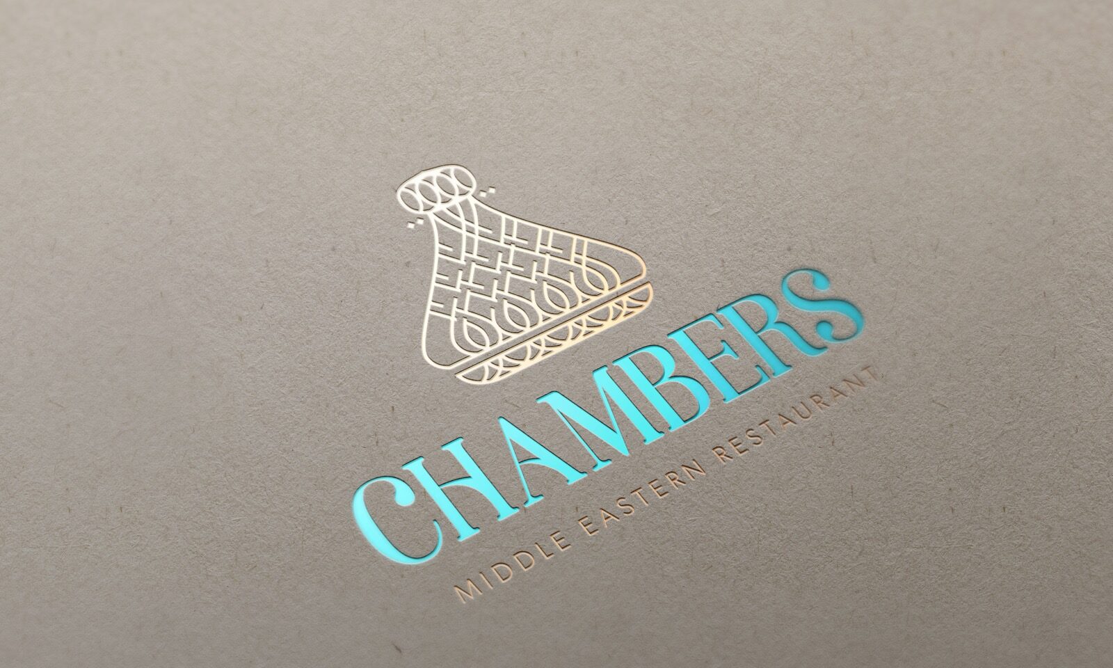 The Chambers logo in teal and white foil on kraft card