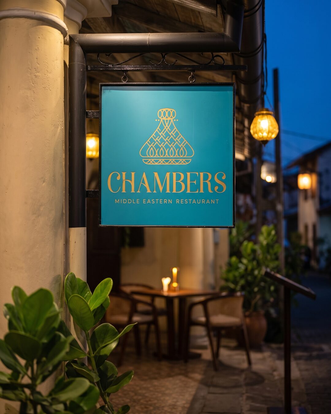 The hanging sign at night