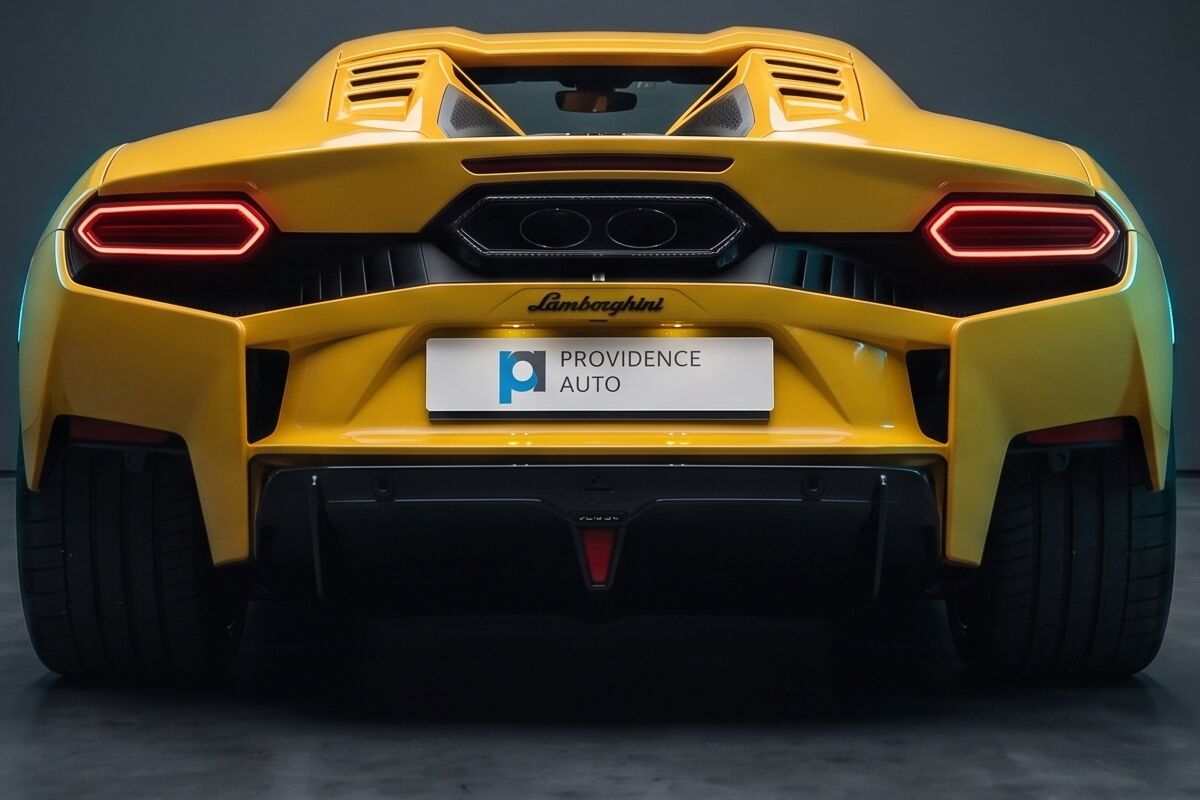 The rear of a yellow Lamborghini Temerario, the Providence Auto plate under the badge